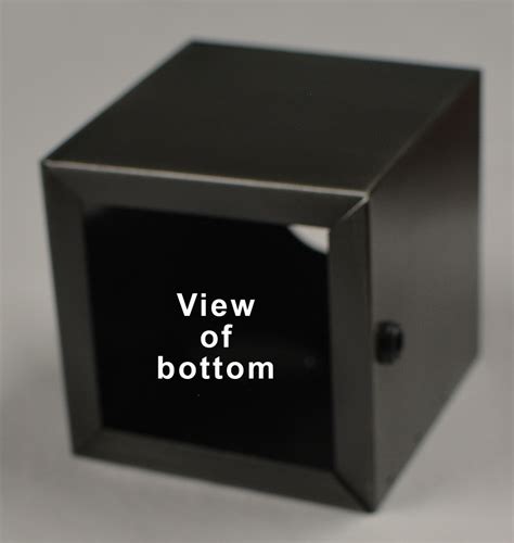 a metal box with square base and vertical sides|metal box with square base.